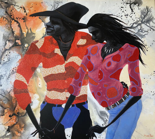 An Aboriginal Stockman dressed up for the rodeo with his Jillaroo Girl.